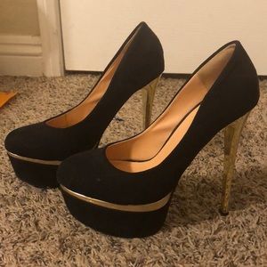 Black and gold pumps
